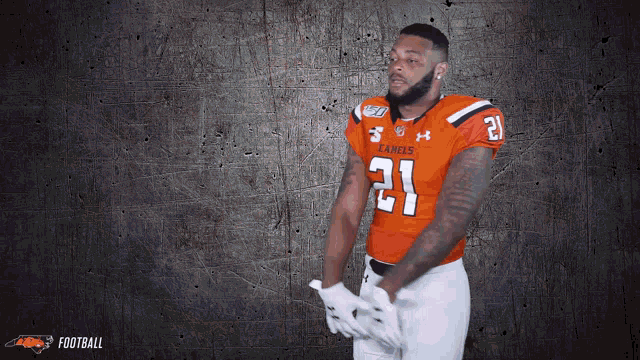 a football player with the number 21 on his uniform