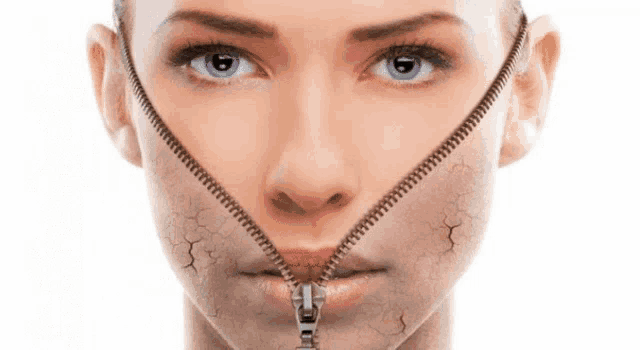 a close up of a woman 's face with a zipper covering her mouth
