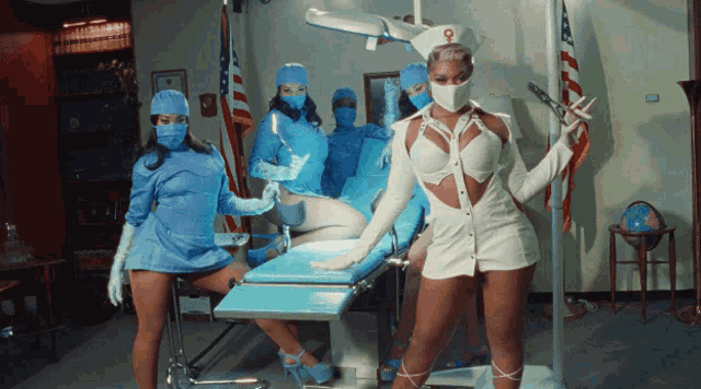 a woman in a nurse costume is holding a syringe in an operating room