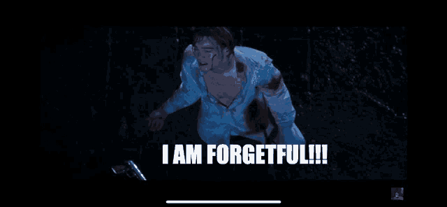 a man in a white shirt is screaming in the rain with the words i am forgetful