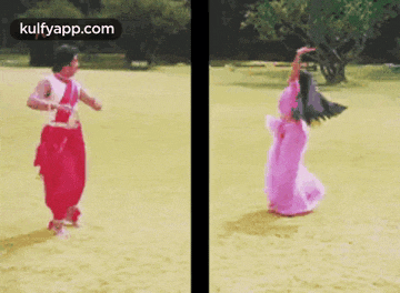 a woman in a pink dress is dancing with a man in a red costume .