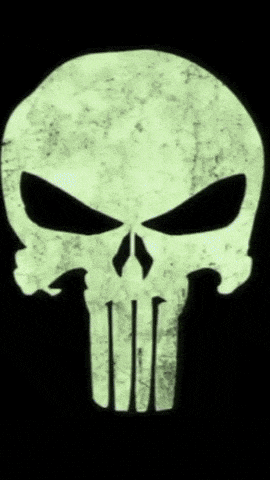 a glow in the dark punisher skull on a black background
