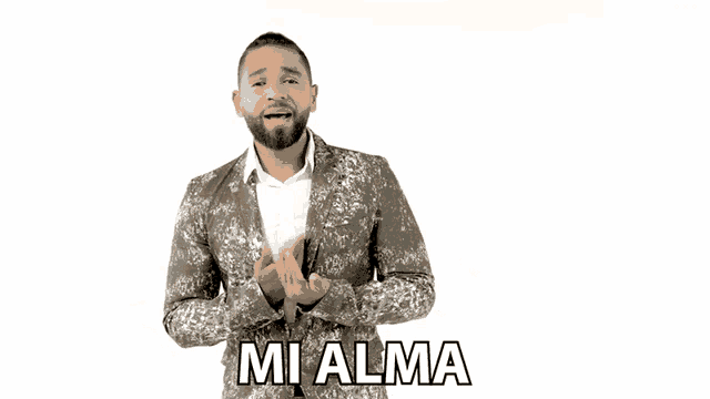 a man in a suit says y tu carinito in spanish