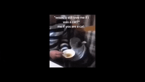 a man is holding a cup of food and talking to another man who is holding a cup of food .