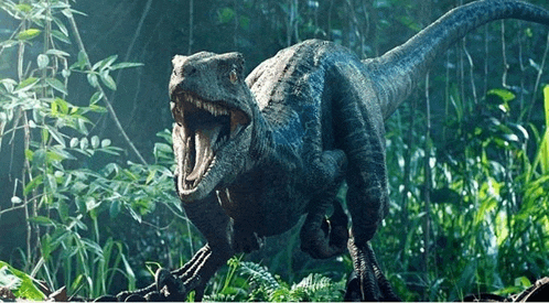 a dinosaur with its mouth open is walking through the woods