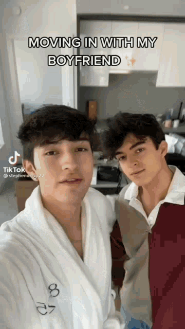 two boys are posing for a picture with the caption moving in with my boyfriend