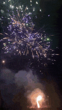 a fireworks display with the letters w and v on it