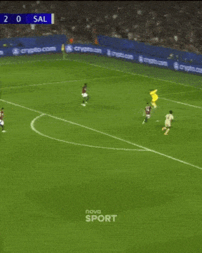 a soccer game is being played in front of ads for crypto.com