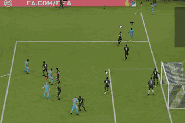 a soccer game is being played in front of a sign that says ' stella ' on it
