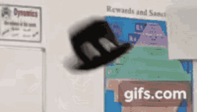 a gifs.com ad is displayed in front of a rewards and scenic poster