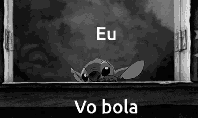 a black and white cartoon of stitch looking out a window with the words eu vo bola below him