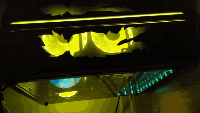 a dark room with a yellow light that says ' ucs ' on it