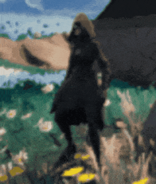 a blurry picture of a person in a field
