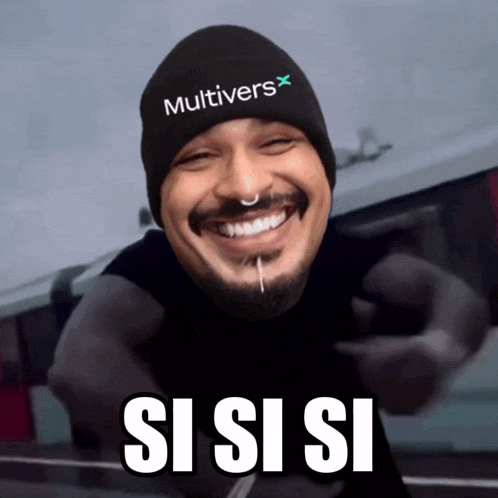 a man wearing a black beanie that says multivers on it