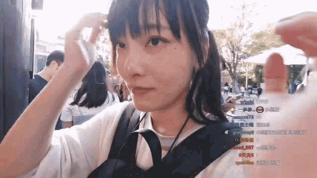 a girl 's face is visible in a blurry photo with chinese writing on the bottom right corner