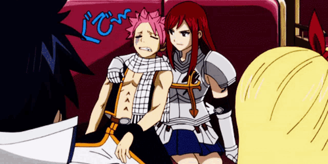a couple of anime characters are sitting next to each other and one of them has a scarf around his head