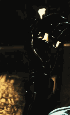 a close up of a black object in the dark