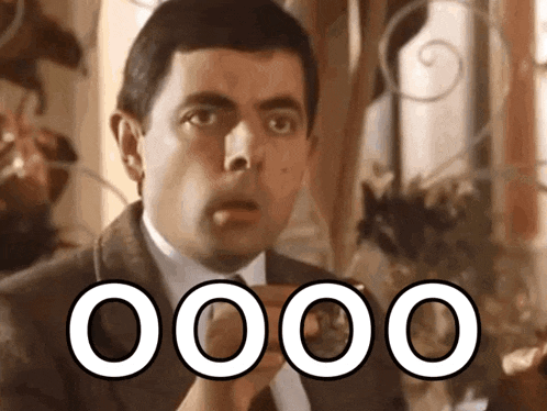 a man in a suit and tie is holding a cup of coffee with the word oooo written in white letters