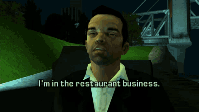 a man in a suit is talking about being in the restaurant business