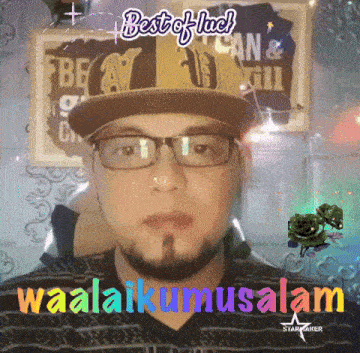 a man wearing glasses and a hat says best of luck waalaikumusalem