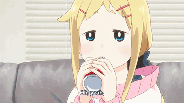 a girl with blonde hair is drinking a can of soda and says oh yeah