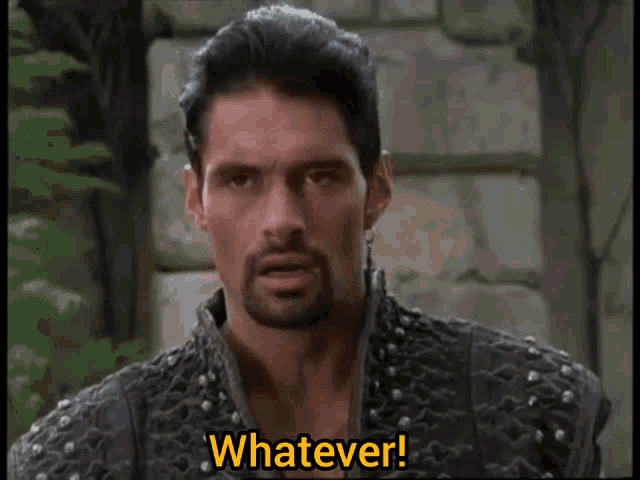 a man with a beard says whatever in a movie scene