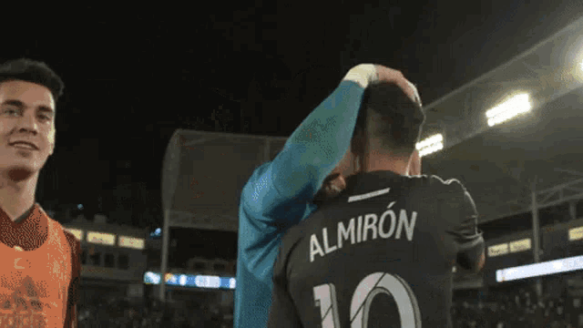 a soccer player with the number 10 on his jersey