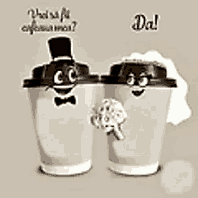 a couple of coffee cups with faces on them .