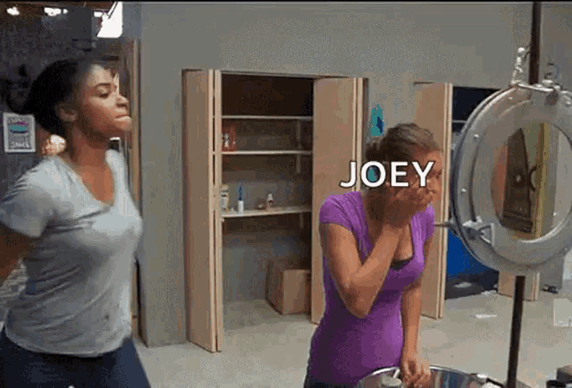 two women are standing in front of a mirror with the word joey on the bottom