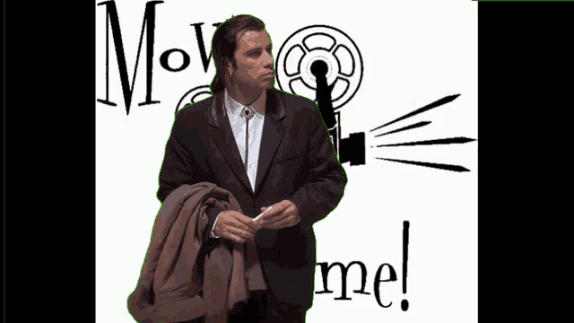 a man in a suit is standing in front of a poster that says move me