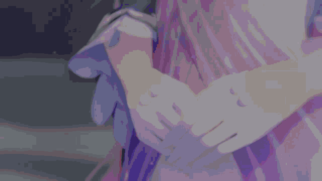 a close up of a person 's hands with white gloves