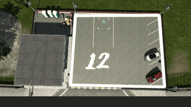 an aerial view of a parking lot that has the number 12 on it