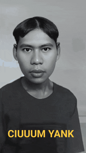 a black and white photo of a man with the name ciuuum yank