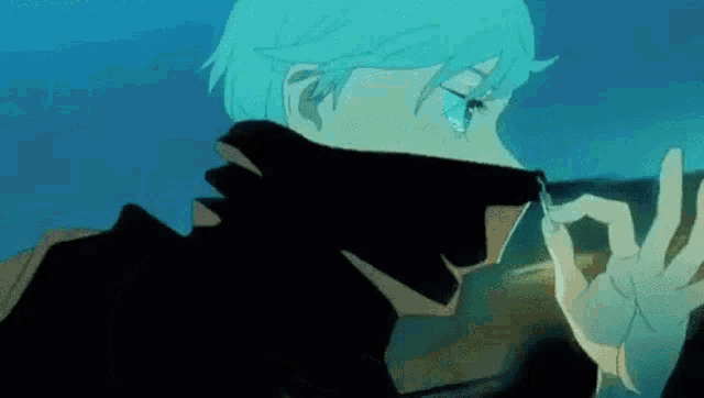 a close up of a person 's face with blue hair and a black jacket .