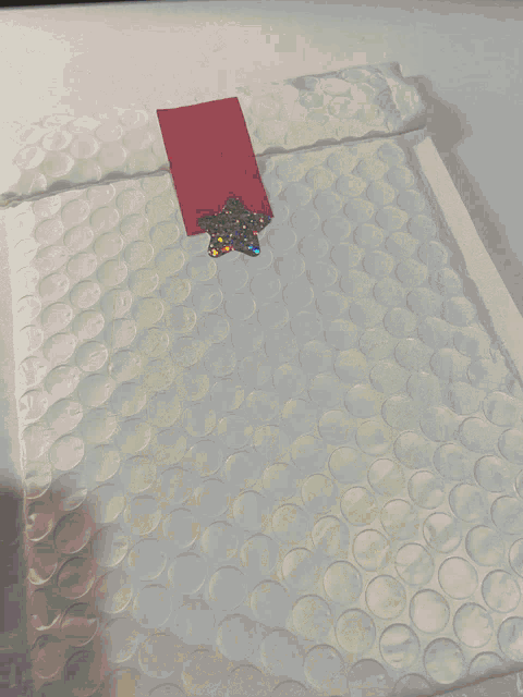 a card that says mhoodip event is sitting on a table
