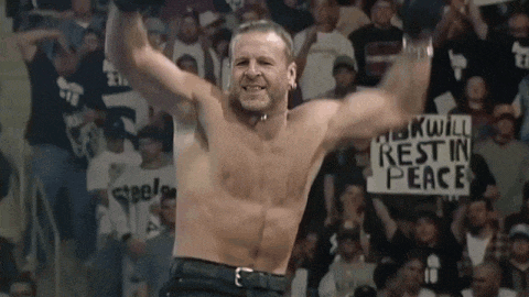 a man without a shirt is holding a sign that says " rest in peace "