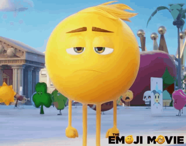 a poster for the emoji movie shows a yellow smiley face