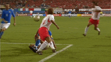 a soccer player with the number 12 on his jersey
