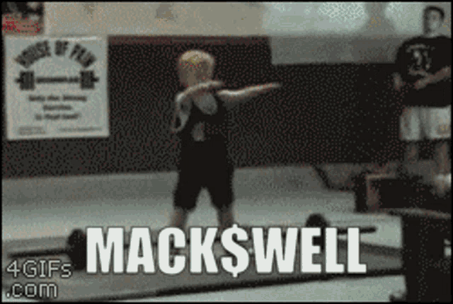 a little boy is doing a dance with the word mackswell written on the bottom