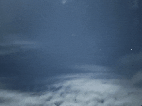 a dark blue sky with a lot of clouds