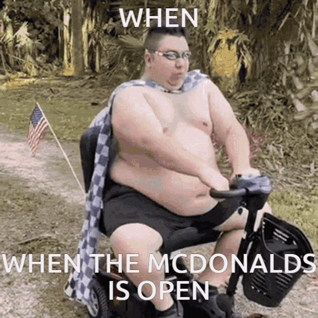 a shirtless man is sitting in a mobility scooter with the caption when the mcdonalds is open