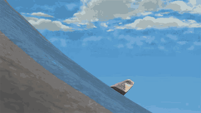 a computer generated image of a cat sliding down a mountain