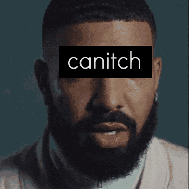 a close up of a man 's face with the word canitch above his eyes