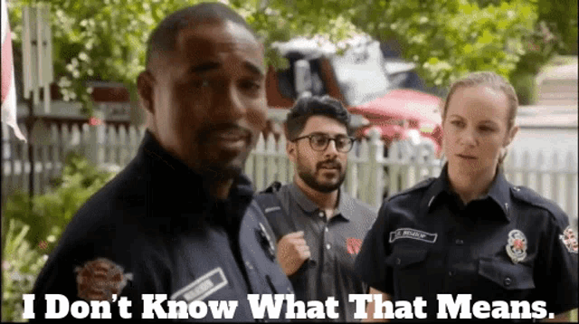 a group of firefighters standing next to each other with the caption " i don t know what that means "