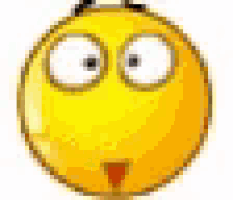 a close up of a yellow smiley face with big eyes and a triangle nose .