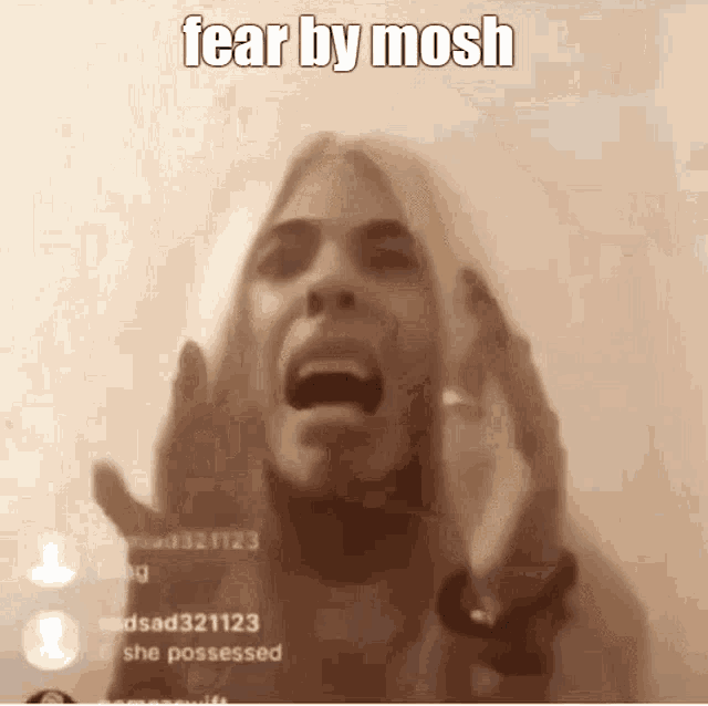 a woman is screaming with her mouth open and the words fear by mosh written on the bottom .
