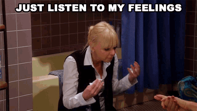 a woman sitting in a bathtub with the words just listen to my feelings below her