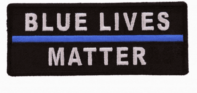 a black patch that says blue lives matter with a blue line