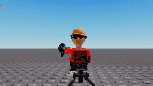 a man in a hard hat is holding a gun