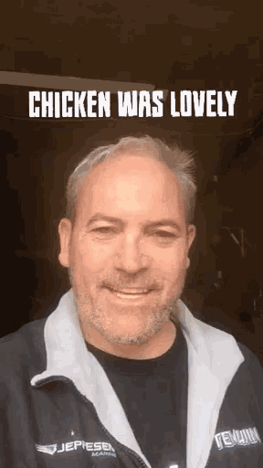 a man wearing a jepiesen jacket is smiling with the caption chicken was lovely